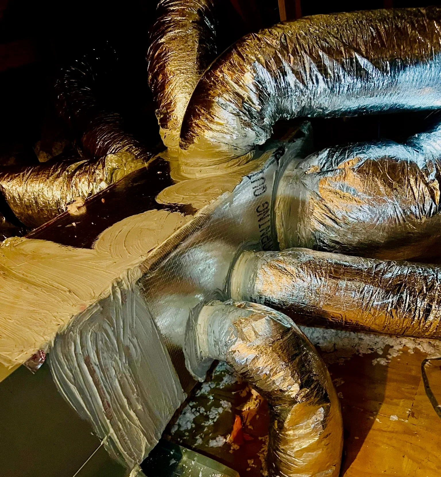 Old HVAC duct being replaced by Andrew and Sons Air Duct Cleaning, LLC during a residential duct replacement in Austin, TX