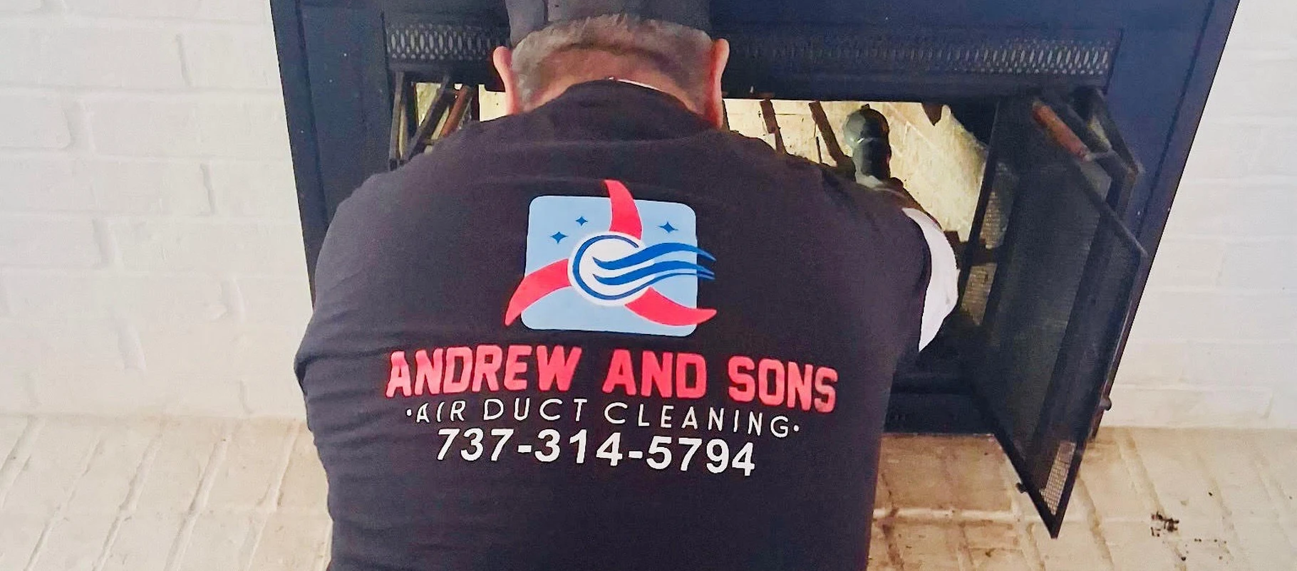 Andrew and Sons Air Duct Cleaning, LLC technician working at a customer fireplace