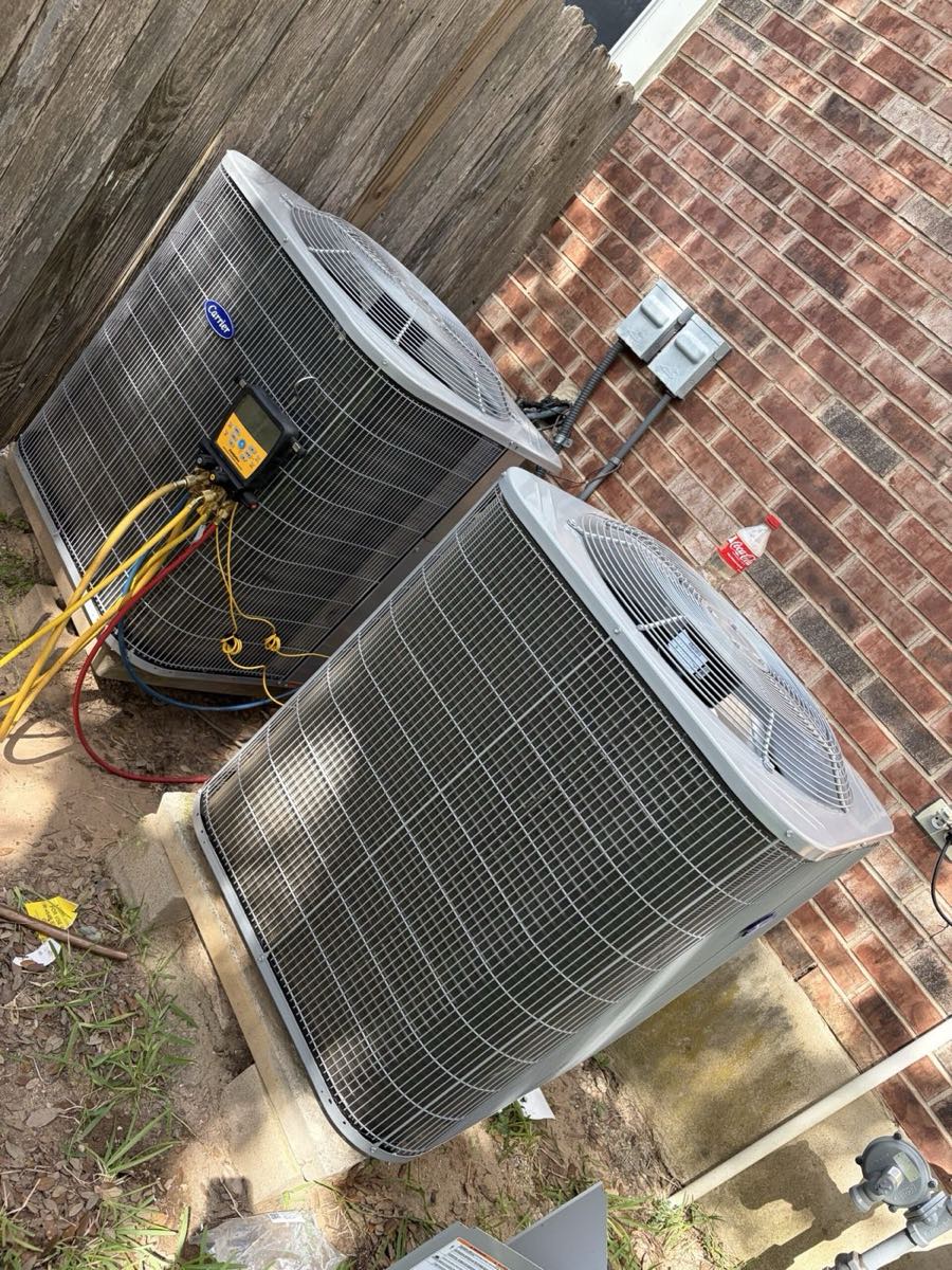 Outdoor HVAC condenser units serviced in Austin, TX by Andrew and Sons Air Duct Cleaning, LLC