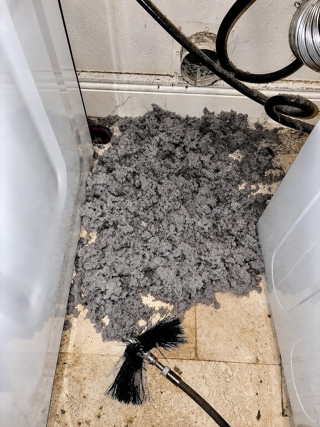 Heavy lint build-up in a Round Rock home dryer vent before cleaning