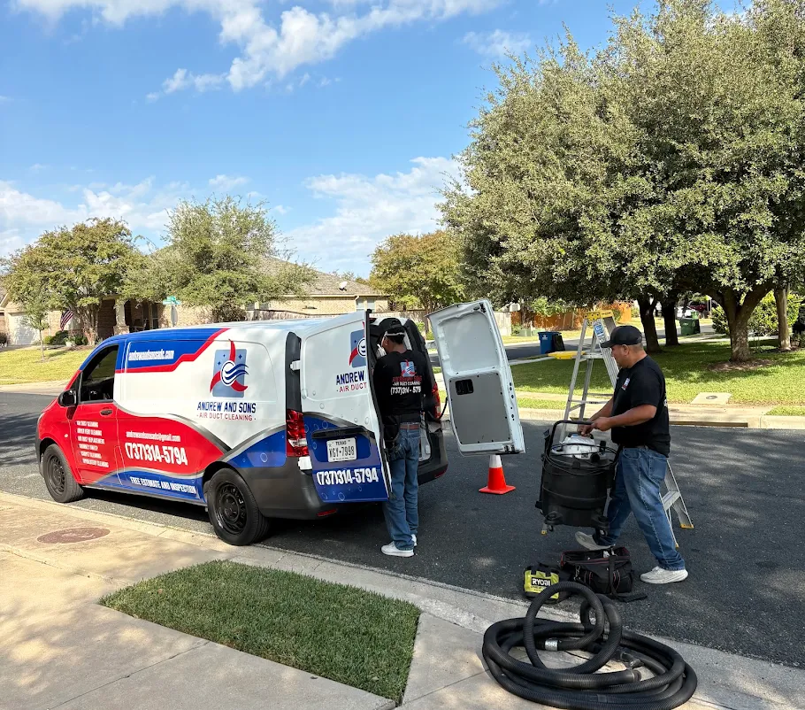 The Andrew and Sons Air Duct Cleaning, LLC crew unloading equipment from the van at a Central Texas home